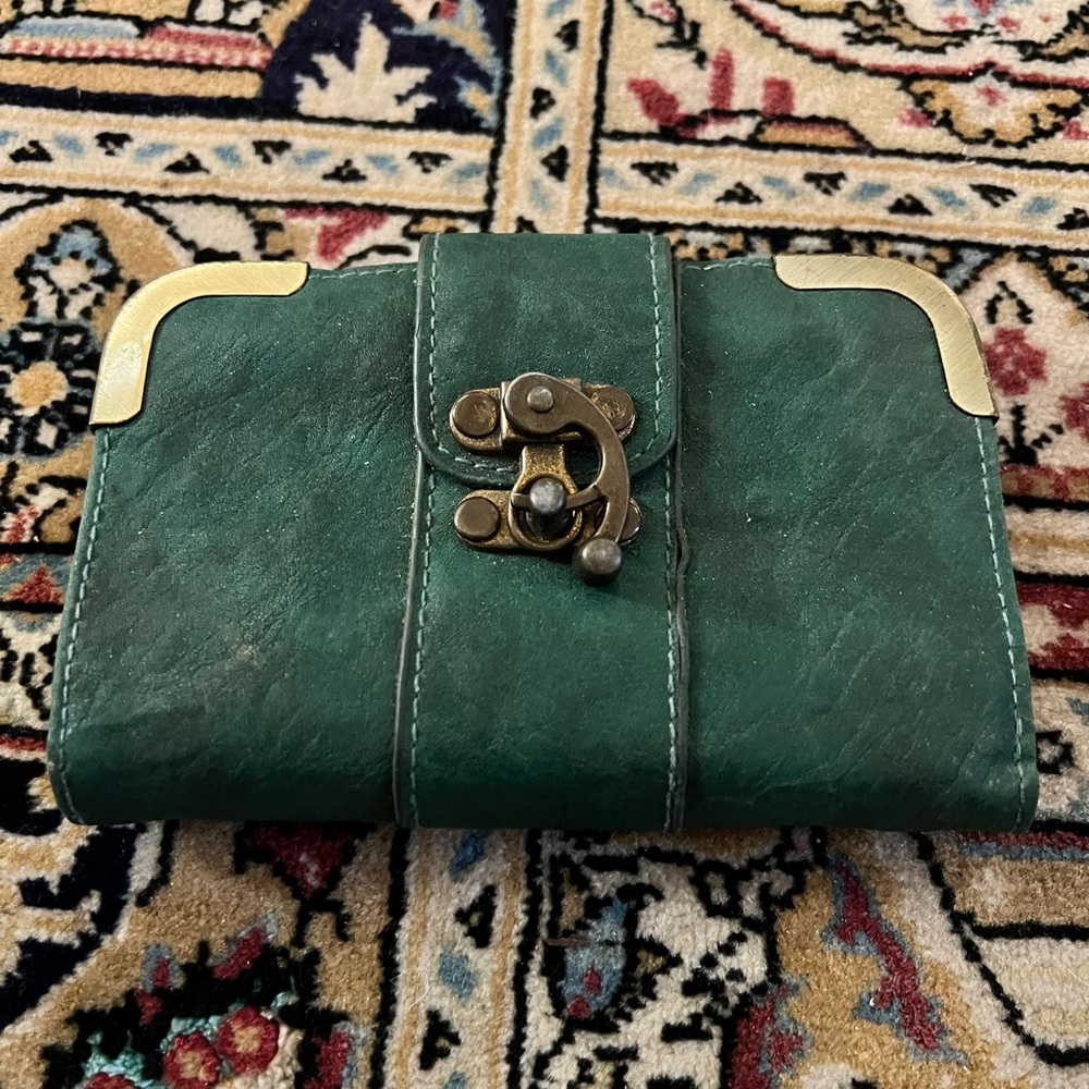 Forest green BDG wallet from urban outfitters with gold hinge clip